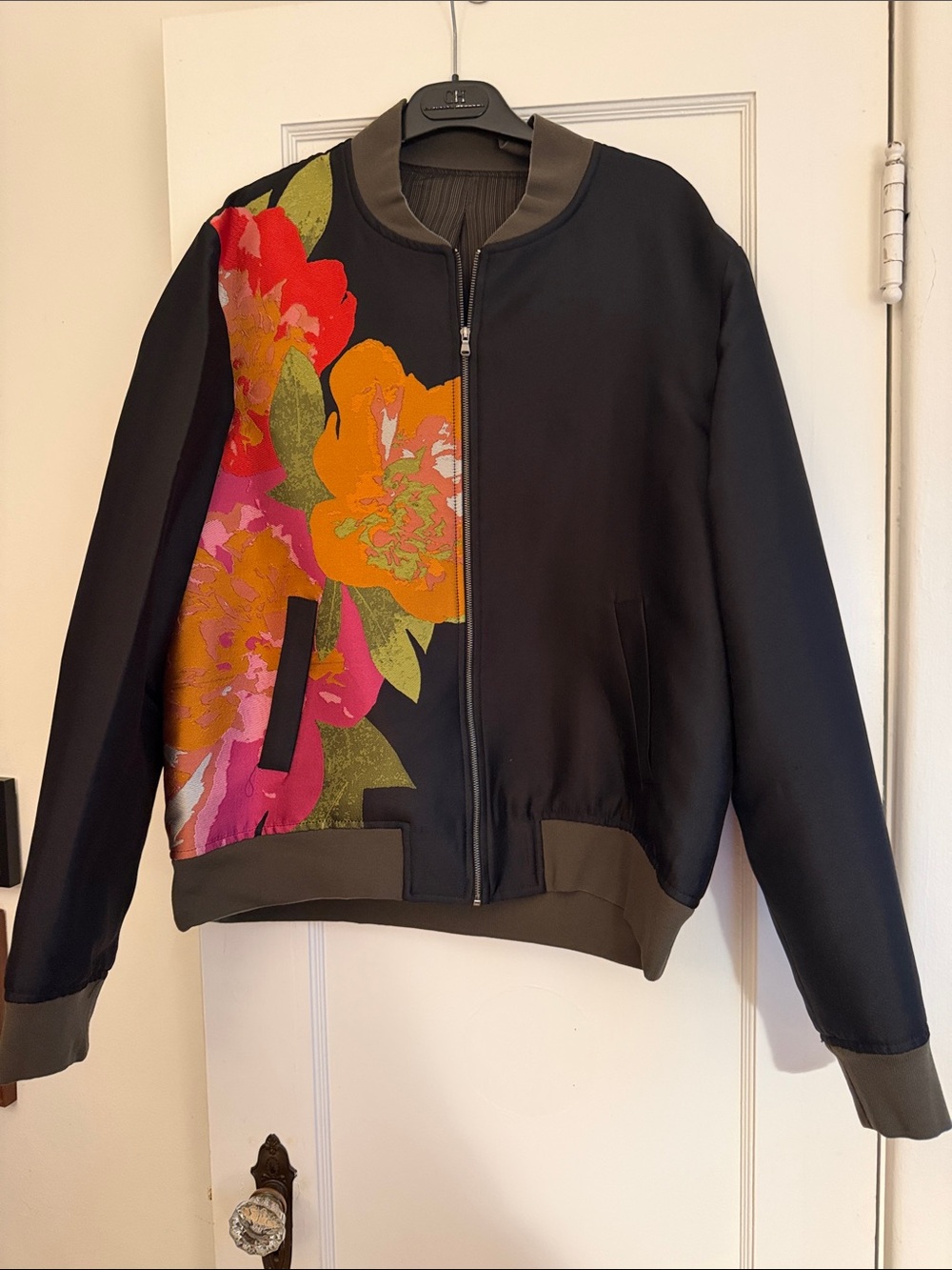 Black Bomber Jacket with Bold Floral Print and Olive Trim